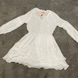 White long sleeve tiered dress. New with tags.